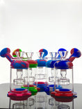Load image into Gallery viewer, Five silicone/glass rigs.