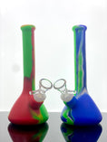 Load image into Gallery viewer, a red and green silicone beaker and a blue and green silicone beaker.